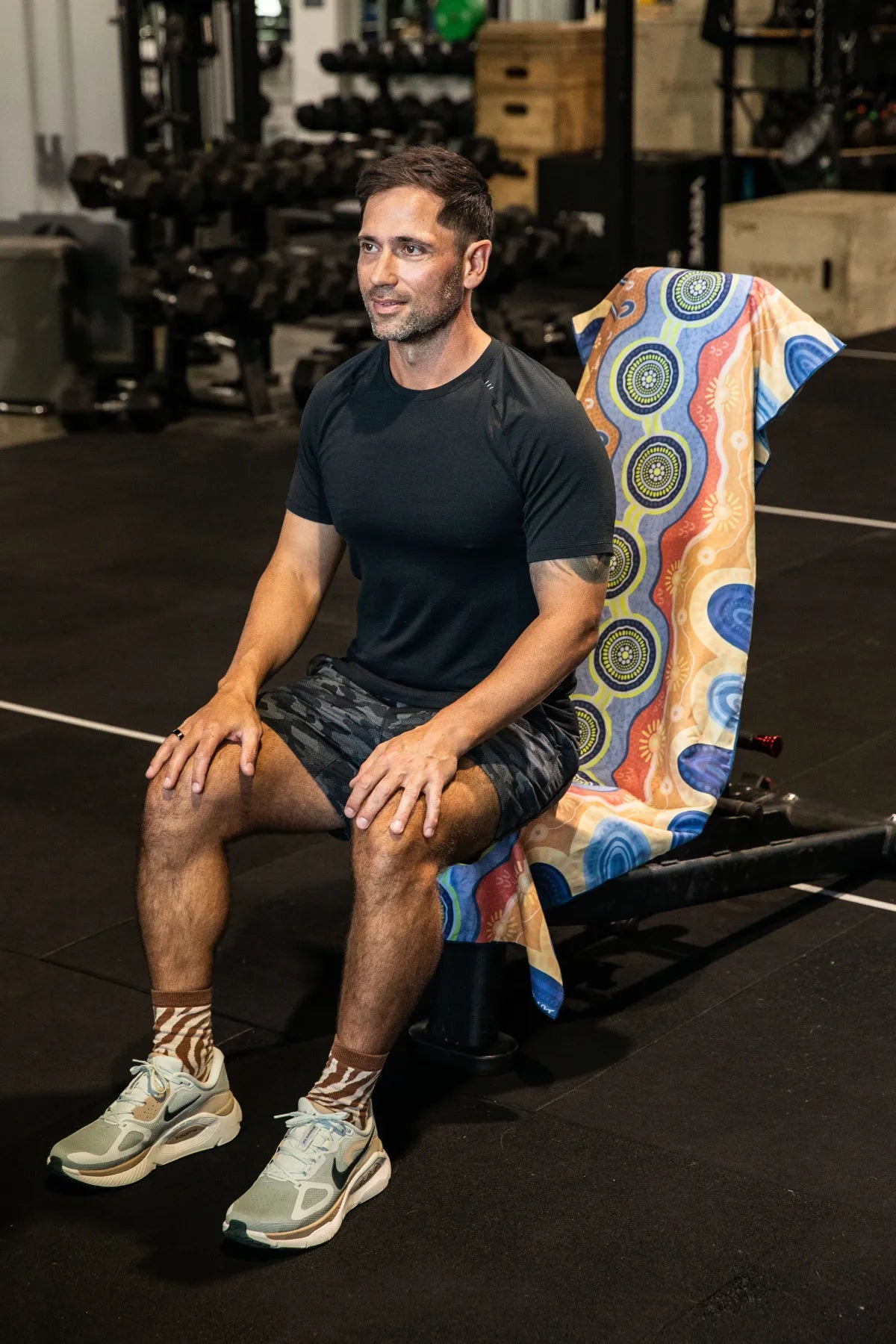 Calm Mind Indigenous hooded gym towel by Aboriginal artist Mirii Art, 140x60cm with zip pocket in hood, stays on gym bench, quick-dry and odour resistant by Cheeky Winx Australia.
