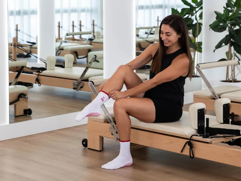 Why Reformer Pilates Studios Require Grip Socks 1