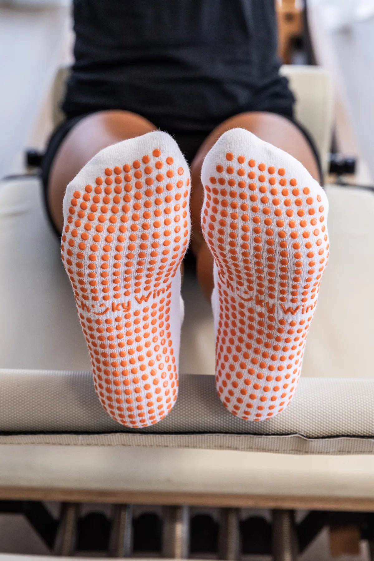 White ankle grip socks with embroidered Aperol Spritz glasses and non-slip sole for reformer, Pilates, yoga, and barre by Cheeky Winx. Australia's best grip socks.