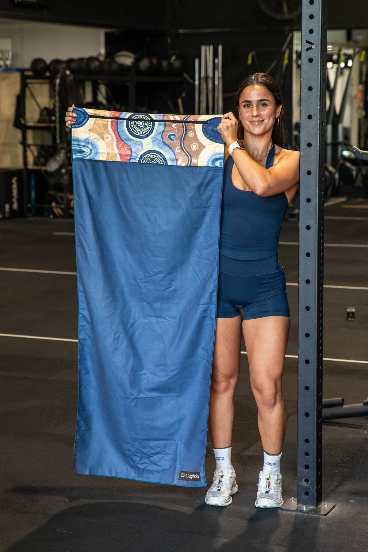 Calm Mind Indigenous hooded gym towel by Aboriginal artist Mirii Art, 140x60cm with zip pocket in hood, stays on gym bench, quick-dry and odour resistant by Cheeky Winx Australia.